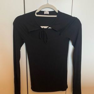 Simple, timeless black knit with cute neckline details